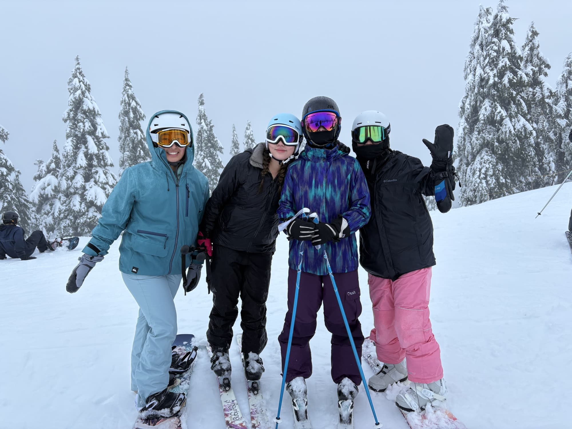 Katrina and friends in snow gear on the mountain